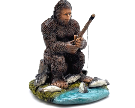 Bigfoot Catching Dinner Figurine